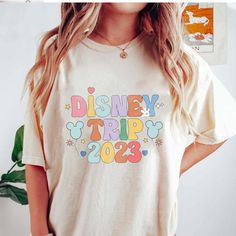 Buy Disney Trip 2023 Shirt, Matching Disney Shirts, Disney kids shirts, Family Matching Tee is designed & sold by Eration Loath. SKU 40929939 listed on 03 30, 2023. Most ship worldwide within 24 hours. Delivery to the United States. Htv Ideas, Disney Fits, Disney Wear, Disney Tee Shirts, Disney Trip Shirts, Trip Shirts, Retro Disney, Disney Outfit, Mode Chanel