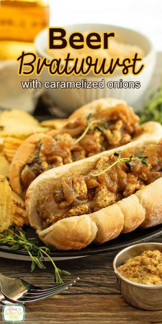 beer bratwurst with caramelized onions on a black plate next to chips