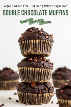 chocolate muffins stacked on top of each other in front of the words double chocolate muffins