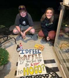 two people kneeling down next to a sign that says i'd feel waffle if you said no to hogo?