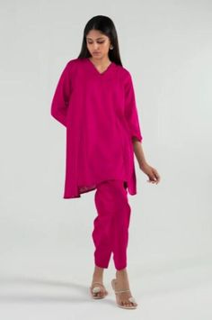 Introducing our stunning and chic two-piece kurta and pants set - a must-have addition to your wardrobe. Made from high-quality fabric, this set is designed for both comfort and style. The kurta features delicate details that add a touch of elegance to your look. The length of the kurta is just right, hitting just above the knees for a modern and sophisticated look.  The pants are designed in a straight leg style, featuring a comfortable and adjustable waistband for a perfect fit. The length is just right to complement the kurta, creating a cohesive and stylish outfit. Whether you're attending a wedding, Eid celebration, or simply want to elevate your everyday look, this set is perfect for any occasion. Pair it with your favorite accessories, shoes, and bag to create a complete look that w Pink Pant Set With Straight Kurta, Pink Pant Set With Dabka Work, Pink Bollywood Pant Set With Chikankari Embroidery, Festive Pink Set With Set-in Sleeves, Designer Tunic Sets With Dabka Work, Unstitched Pink Pant Set With Chikankari Embroidery, Festive Tunic Set With Dupatta, Eid Dabka Palazzo Set With Tunic, Semi-stitched Pink Pant Set For Eid