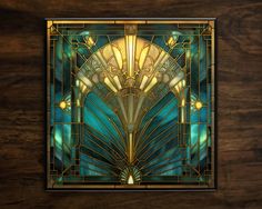 an art deco style stained glass window with gold and blue accents on a wood background