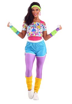 a woman in colorful clothing is posing for the camera with her hands out and arms outstretched