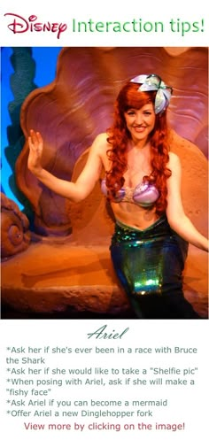 a woman with long red hair wearing a mermaid costume