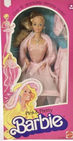 the barbie doll is in its pink box