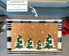 a door mat with trees on it and the words layering rugs are now available link in description