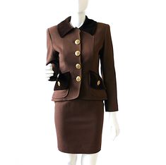 Vintage 2-Piece suit separates with short pencil skirt and blazer made in the 1980's by Christian LaCroix Paris. Fits modern size x-small to small, tags list Euro size 36. Please see specific measurements below to check sizing because vintage clothing sizes vary from modern sizes FEATURES: * Military inspired styling * Brown wool fabric with textured twill weave * Velvet collar and pockets * Large gold and enamel metal buttons * Jacket front flap pockets * Fully lined blazer and skirt * Jacket lined with beautiful paisley & stripe pattern * Shoulder pads * Straight waistband skirt * Zipper and tab button closure at back of skirt * 100% Wool, Lining: 55% Acetate, 45% Rayon * Excellent condition, a couple minor fabric pulls at arm MEASUREMENTS (in inches, taken lying flat): Jacket- Shoulder 1940s Skirt Suit, Paris Fits, Vintage Skirt Suit, Short Pencil Skirt, Velvet Collar, Velvet Suit, Brown Tweed, Skirt Suit Set, Blazer And Skirt