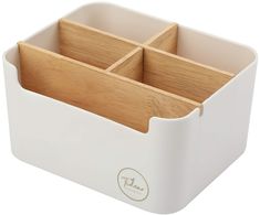 three wooden compartments in a white container