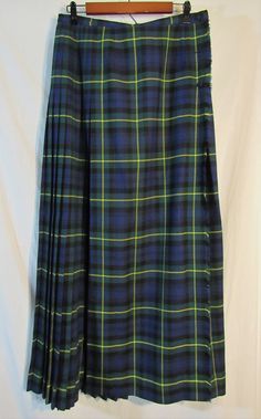 "Fall and winter mean wool skirts!  Long ones. Warm ones. Ones from Canada. Here's a 1970s Vintage Aljean Canada Wool Blue/Green Plaid Wrap Pleated Fringe Long Skirt! Measured Women's Waist 30\" Great tartan traditional plaid in blue, green, black, and yellow. Mint, unworn condition, I found no flaws. Smoke free. Great quality fabric and construction here on this one. Please see my shop for more quality and interesting vintage wool clothing, plaid, and more! New items daily.  PLEASE check the me Skirts Long, Wool Clothing, Long Skirts For Women, Wool Skirts, Vintage Textiles, Green Plaid, Kilt, Vintage Wool, Tie Dye Skirt