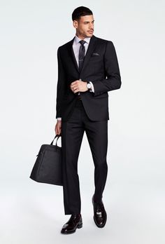 Hemsworth Black Suit Sleek Black Wool Blazer, Tailored Black Wool Three-piece Suit, Timeless Black Wool Blazer, Black Slim Fit Suit For Business Casual, Modern Black Suits For Workwear, Modern Black Blazer For Business, Modern Black Business Blazer, Modern Suit For Office, Modern Suit For Office Made Of Suiting Fabric