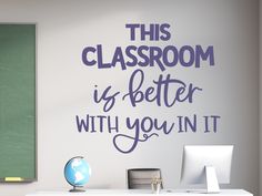 this classroom is better with you in it wall decal on a white desk next to a green chalkboard