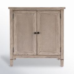 an old wooden cabinet with perfored doors