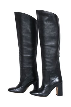 Feel your most fashionable in these Stuart Weitzman black leather tall boots! Step out from the crowd in style this fall whether you dress them up with a little black dress or down with a sweater knit for a cozy, downtown-darling look. Kicking off the season never looked so chic! Size 6 100% Leather Pull on Come with box Heel height 3" Shaft 18" Circumference 15" Classic Medium Width Heeled Boots For Fall, Fall Business Mid-calf Boots Medium Width, Elegant Tall Knee-high Boots For Fall, Wide Calf Boots For Business In Fall, Tall Knee-high Boots For Formal Fall Occasions, Tall Formal Knee-high Boots For Fall, Sleek Leather-lined Knee-high Boots For Fall, Leather Lined Knee-high Boots For Workwear In Fall, Classic Heeled Boots For Work In Fall