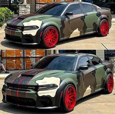 the camouflage camo car is parked in front of a building with red rims