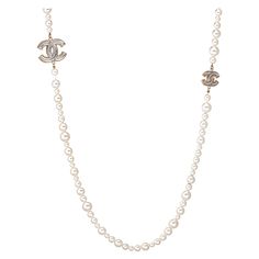 Pre-owned Chanel graduated faux pearl necklace (or belt) crafted in silver tone (circa 2012). The necklace features graduated 6mm to 12mm faux white pearls. Two CC logos separate the beads. The necklace can be worn as a long 48 inch chain or wrapped as a double strand necklace. Also great for wear as a belt. The necklace is in very good condition showing minimal wear. Chanel travel pouch also included. Particulars: Weight: 136.6 grams Size & Measurements: The necklace measures 48 inches in lengt Double Strand Pearl Necklace, Vintage Jewelry Ideas, Chanel Pearl, Chanel Necklace, Chanel Pearls, Graduation Necklace, Random Images, Double Strand Necklace, Pearl Necklaces