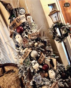 a christmas tree decorated with ornaments and ribbons