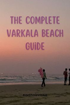 the complete varkala beach guide with two people walking on the beach at sunset in front of the ocean