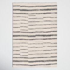 a white rug with black lines on it