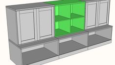 an image of a cabinet with green doors and drawers in it's center section