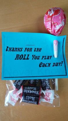 candy bar wrapper and lollipops on table