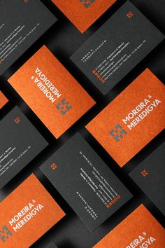 many orange and black business cards stacked on top of each other with the words meridian medical