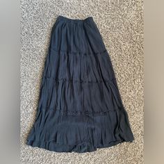 Never Worn. Nwt! Black Maxi Skirt. High Rise. Excellent Condition. Bohemian Black Skirt For Day Out, Flowy Black Maxi Skirt For Day Out, Black Tiered Skirt For Vacation, Black Flared Skirt For Vacation, Black Long Skirt For Vacation, Black Tiered Maxi Skirt For Beach, Black Flared Maxi Skirt For Vacation, Black Tiered Maxi Skirt, Thrift Board