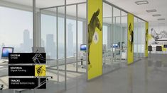 an office with glass walls and yellow partitions on the wall, along with computer screens