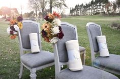 the chairs are decorated with flowers and candles