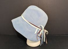 "Cheerful color Cloche/ flapper style Scalloped edge The rabbit felt is light blue and the ribbons are shades of blue &brown made from velvet The interior is ivory polyester The sweat band is beige and is clean Maker is Naftali Abenaim Approximately 21\" around the inside This is pre owned" Blue Rabbit, Cloche Hats, Blue Lamp Shade, Vintage Boy Scouts, Velvet Bows, Sweat Band, Wool Berets, Flapper Style, Vintage Boys