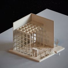 an architectural model of a house with trees in the foreground and snow on the ground