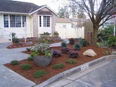 the front yard is clean and ready to be used as a landscaping area for this home