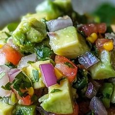 a close up of a plate of food with broccoli and other vegetables