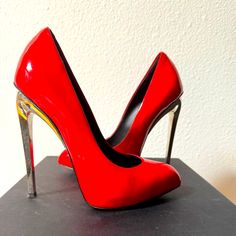 Worn Only Once. In Excellent Condition Modern Red Heels With 4-inch Heel, Bold Evening Heels With Sculpted Heel, Bold Evening Heels With Wrapped Heel, Red High Heel Court Shoes For Evening, Red Round Toe Heels For Gala, Red High Heels With Reinforced Heel, Red Pointed Toe Heels For Gala, Bold Pointed Toe Heels For Formal Occasions, Red Heels With Round Toe For Gala