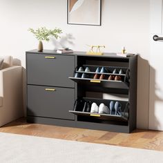 a pair of shoes is sitting on top of a cabinet