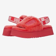 The Ugg Disco Slide Open-Toe Sandal Boasts A Plush 10mm Sheepskin Upper With An Elastic Heel Strap With Ugg Graphic. Sku: #9404962 10mm Sheepskin Lining And Footbed For Added Comfort. Polyester Binding. Eva Outsole. Hibiscus Pink Color Box Not Included Ugg Disco Slide, Ugg Slides, Shoes Ugg, Sheepskin Slippers, Slide Slippers, Ugg Slippers, Slides Women, Platform Slippers, Open Toe Sandals