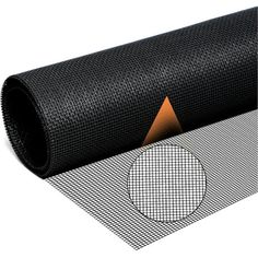 a roll of black mesh with an orange triangle on it's side and a white background