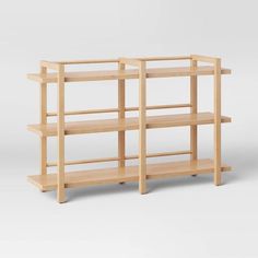 a wooden shelf with three shelves on each side