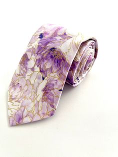 "This light lilac floral necktie, and bowtie are perfect for any special occasion.  The regular necktie is 3.5 inches wide and 59 inches long.  The skinny necktie is 2.5 inches wide and 59\" long." Lavender Wedding Suit, Rose Gold Suit, Light Purple Dress, Chelsea Wedding, Lavender Butterfly, Gold Suit, Missionary Gifts, Purple Spring, Floral Necktie