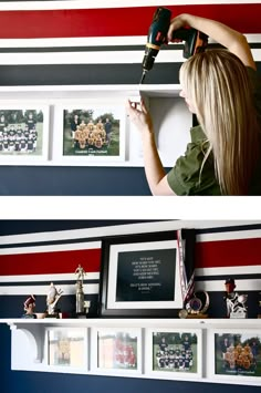 a woman is painting the wall with red, white and blue striped walls behind her