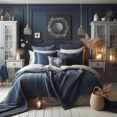 a bedroom with blue walls, white floors and bedding in the middle is lit by candles