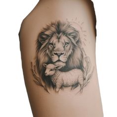 a lion and lamb tattoo on the arm