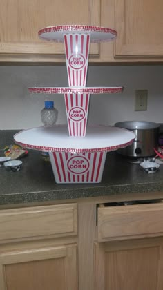 a three tiered tray on top of a counter