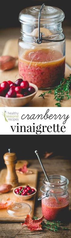 cranberry vinaigrette in a glass jar next to a wooden cutting board