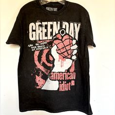 Green Day American Idiot T Shirt Printed On Front . Size Small Chest 18” Length 27@ 100% Cotton New Green Day American Idiot Graphic T Shirt Alternative Graphic Tees, Emo Band Shirts, Green Day Merch, Men’s Graphic Tees, Graphic T-shirt Design, Scene Shirts, 2000s Graphic Tee, Cottagecore Pictures, Green Day T Shirt