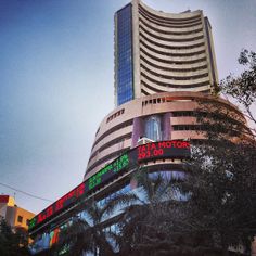 an upward view of the stock market building