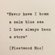 an old typewriter with the words'never have i been a calm blue sea i have always been a storm '