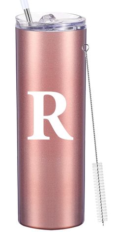 a pink tumbler with the letter r on it and a straw sticking out of it