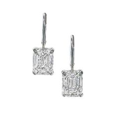 A pair of drop earrings containing 10.01 carats of GIA certified emerald cut diamonds, set in platinum. Ear Piercings Industrial, Diamonds Direct, Preppy Clothes, Emerald Cut Diamond, Diamond Drops, Diamond Drop Earrings, Emerald Cut Diamonds, Emerald Diamond, High Jewelry