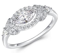 It's time to shine! Pop on this fabulously detailed ring, featuring a marquise-cut sparkler at the center, and even more cubic zirconia Diamonique simulated diamonds on the halo and each end. Detailed Ring, Halo Ring, Halo Rings, Marquise Cut, Ring Sterling Silver, To Shine, Halo, Cubic Zirconia, Jewelry Rings