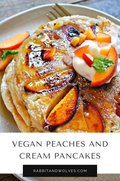 vegan peaches and cream pancakes on a white plate